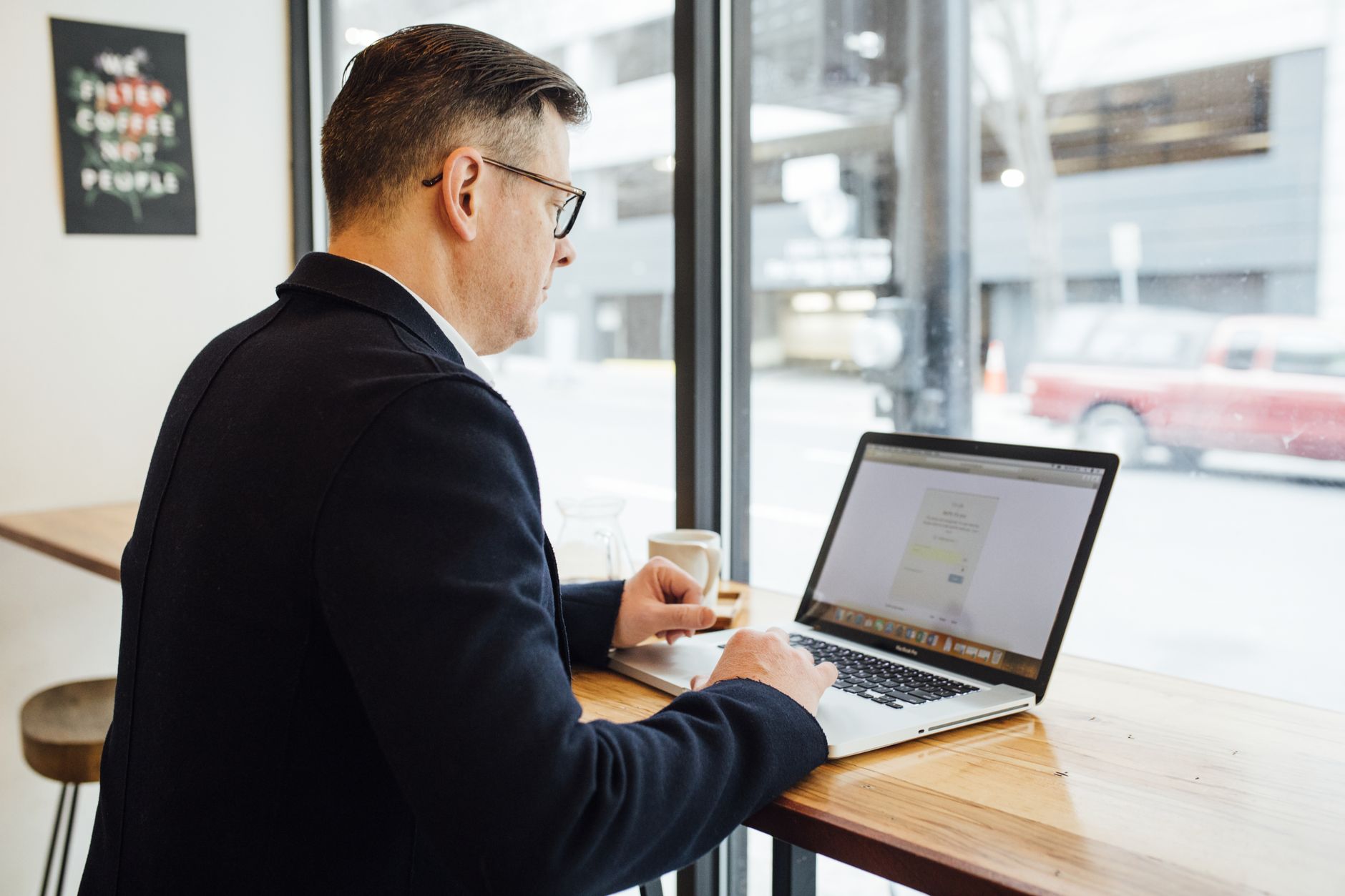 Businesswoman reviewing tasks on smartphone app