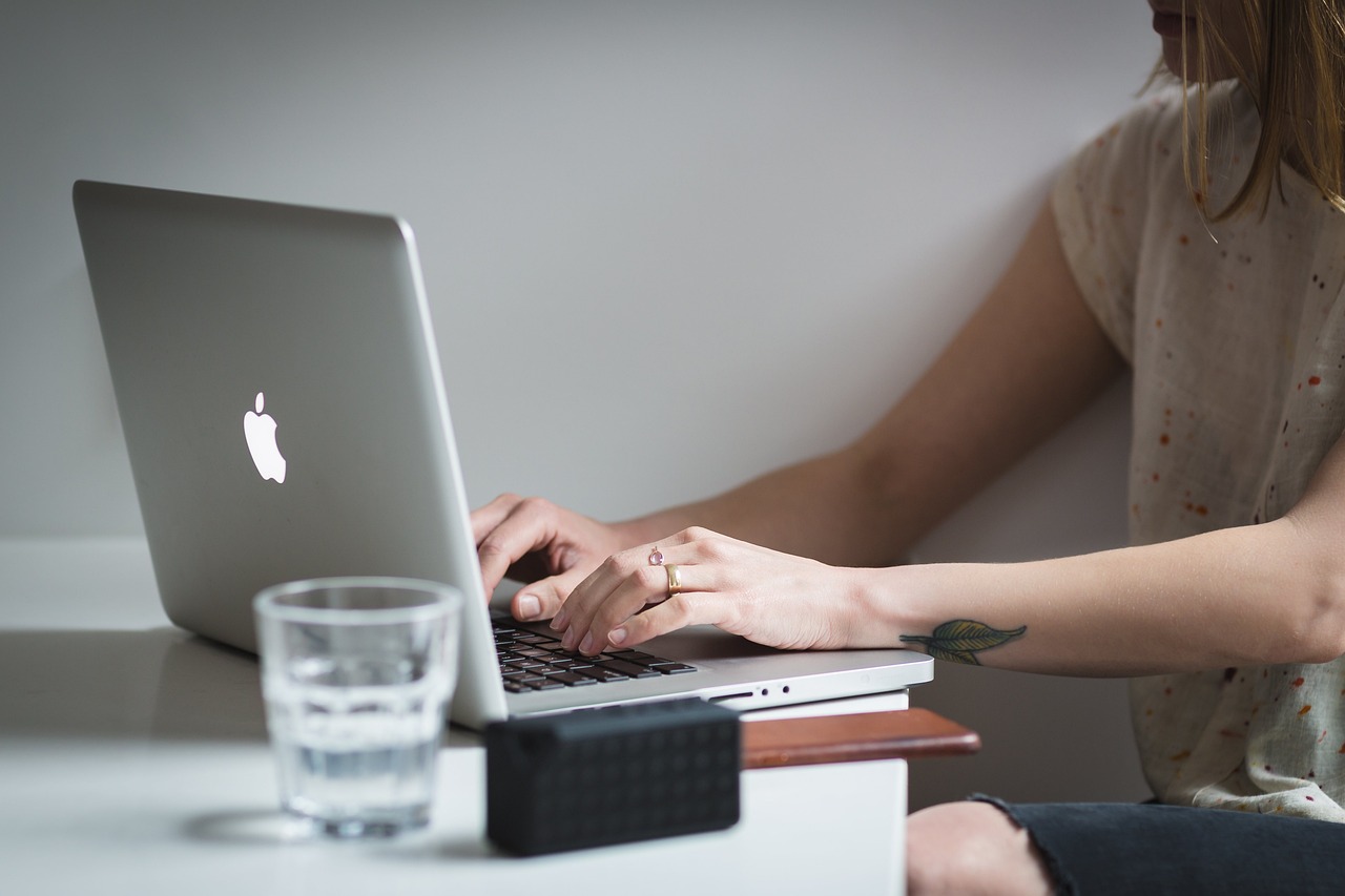 Professionals working in a modern Baltimore office using time management tools