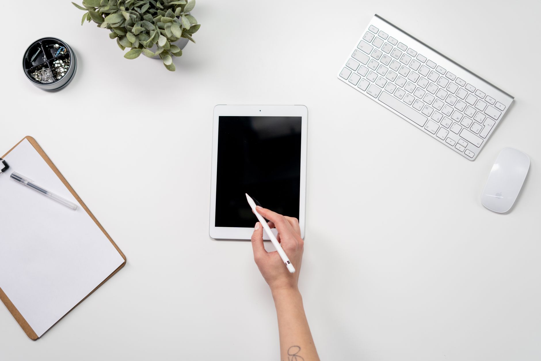 English/Spanish task lists on shared tablet in an El Paso office setting