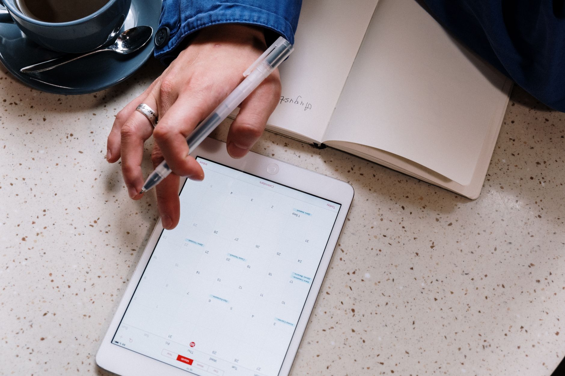 Oil field technician using task management app on rugged tablet