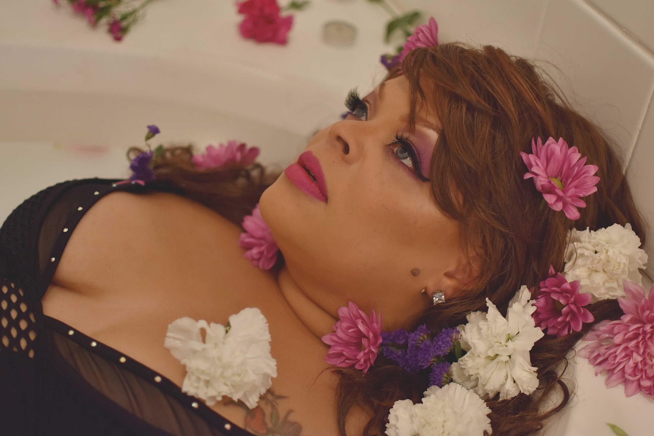 easter, milk bath, bath, milk, skincare, woman, hair, female, fashion, sensual, model, flower bath, bath tub, tub shoot, plus size, boudoir, black queen, dark skin, melanin, makeup, lingerie, social distancing, luna lee, eva exotique, brown makeup, brown social