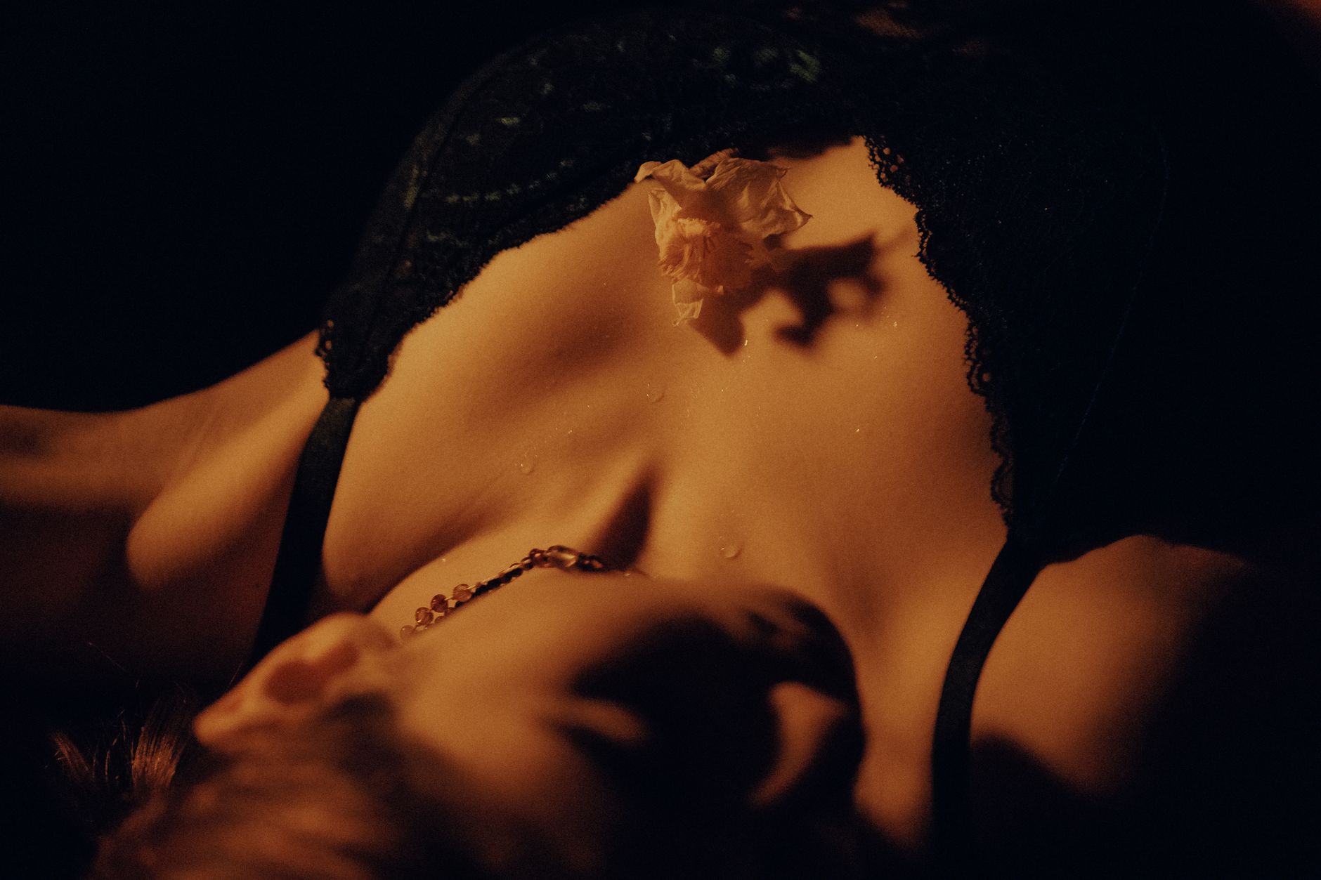 Captivating portrait of a woman in lingerie, captured with soft lighting and artistic composition.
