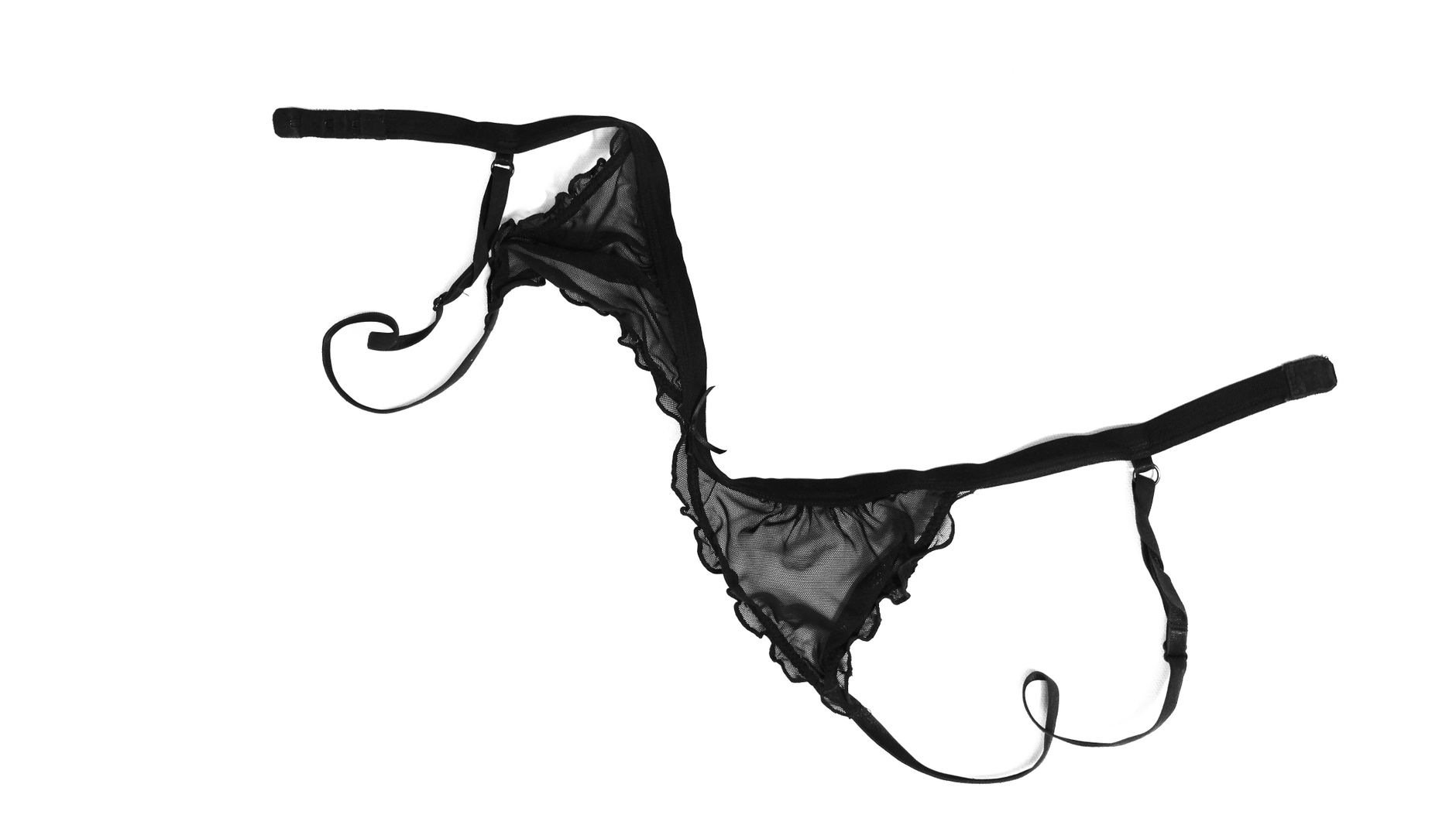 Elegant black lingerie on a plain white background, highlighting its delicate design.