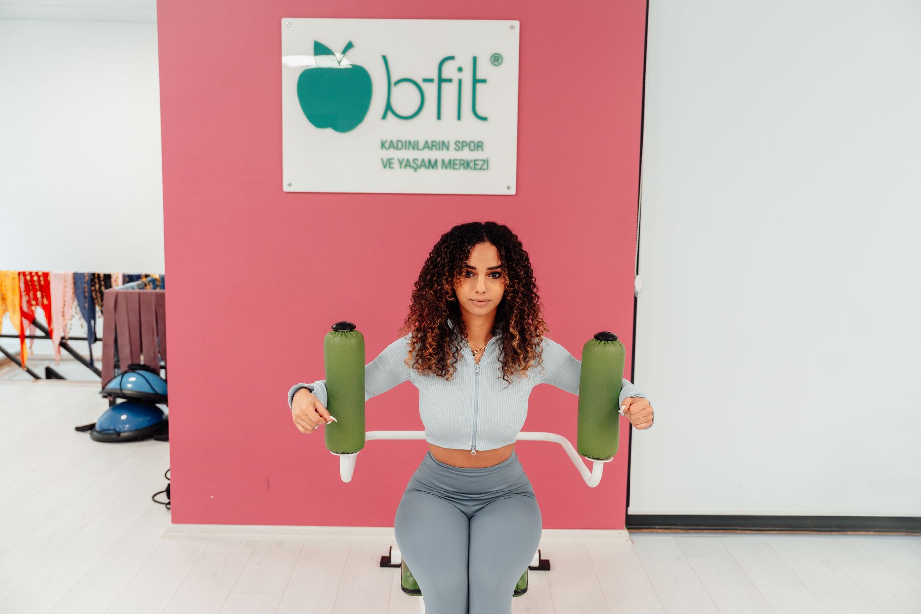 Woman working out in a fitness center in Yalova, Türkiye. Promotes healthy living.