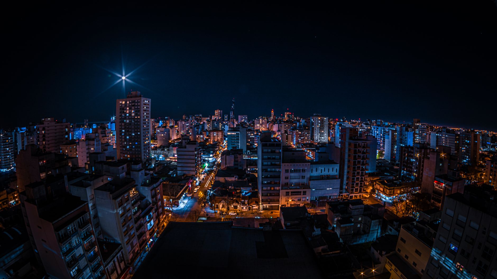 Immerse in the vibrant night cityscape of Mar del Plata, Argentina.