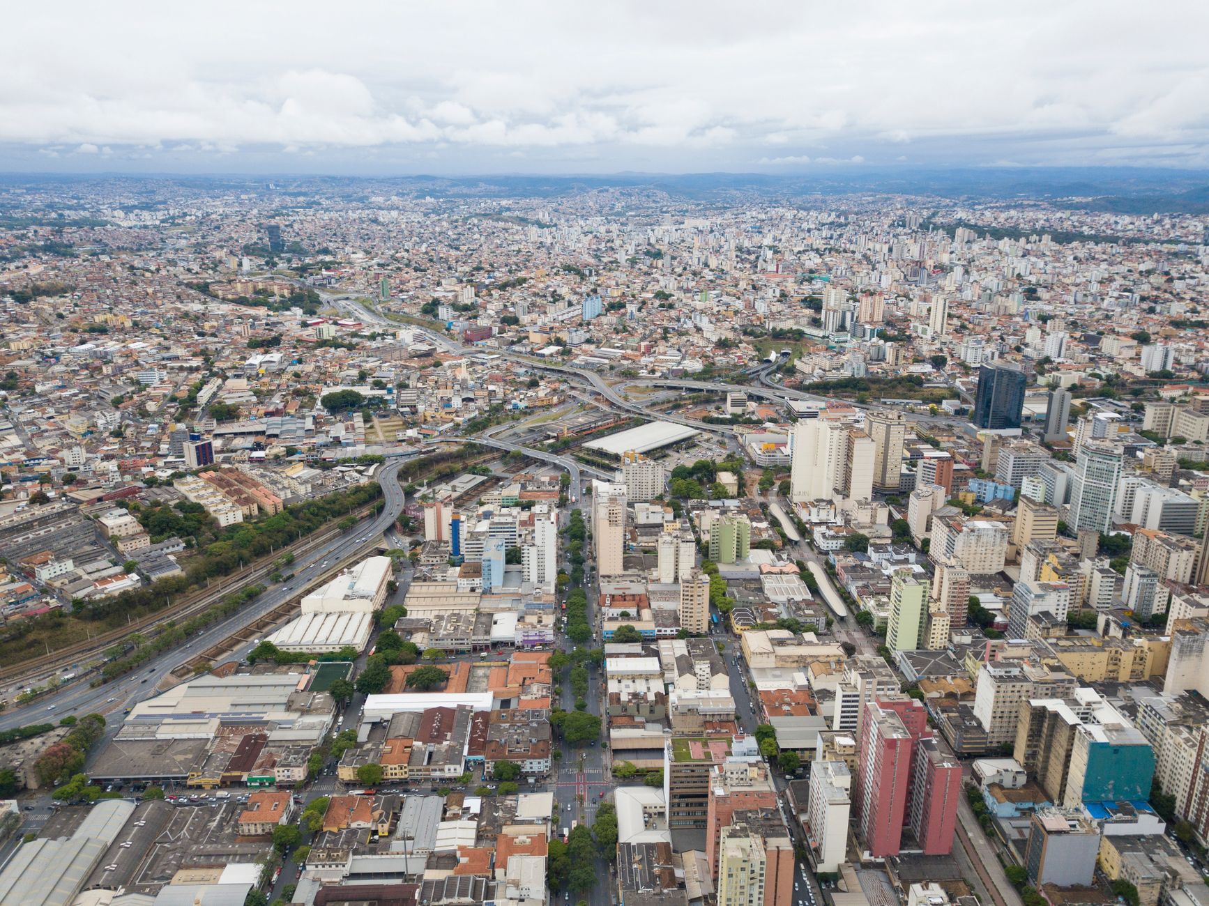 Panoramic aerial view of downtown Belo Horizonte, capturing the dense urban landscape and skyline.