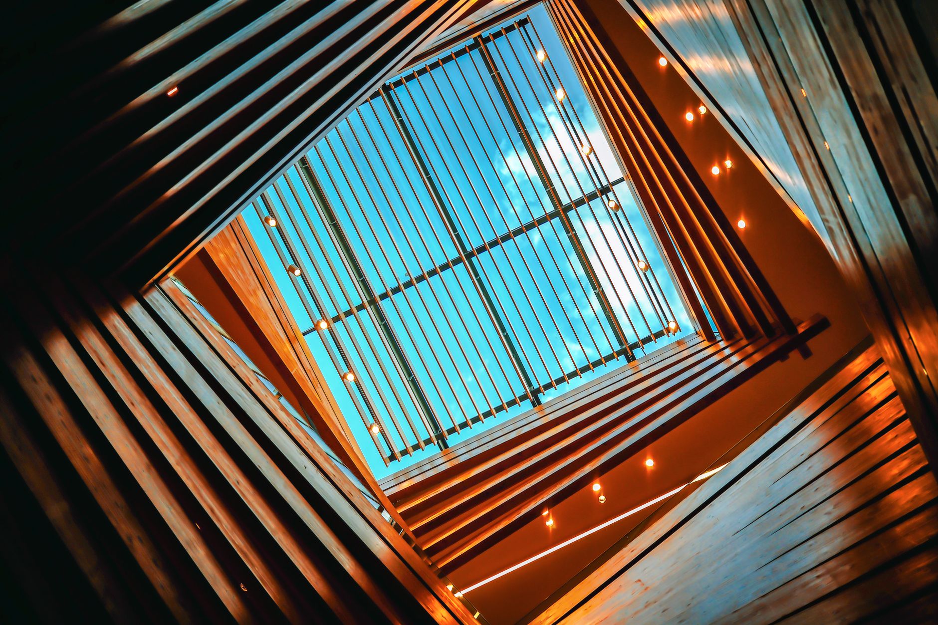 Modern architectural design with a stunning skylight view and wooden beams in Türkiye.