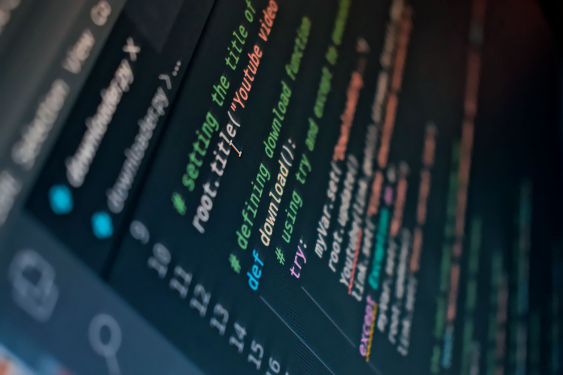 Detailed view of computer code highlighting syntax in colors on a screen.