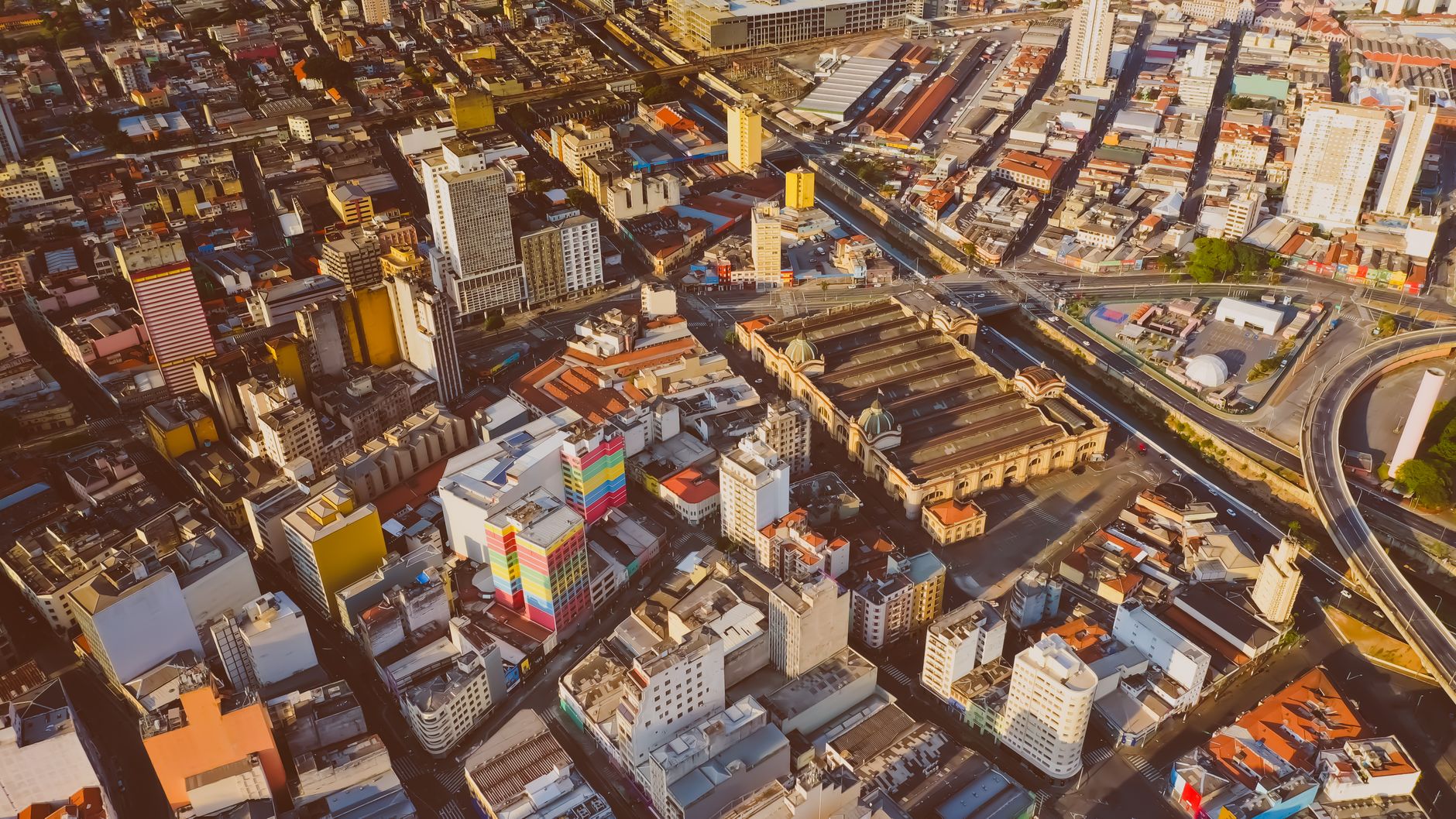 Aerial view of a vibrant cityscape with diverse architecture.