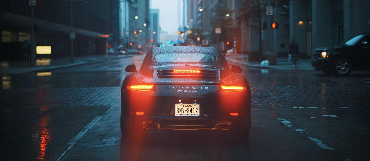 porsche, nature, car, car wallpapers, brake lights, tail lights, stop, stopped, rain, rainfall, raining, street, city street, luxury car, vehicle, transportation, drive, city, rainy, road, urban, wet