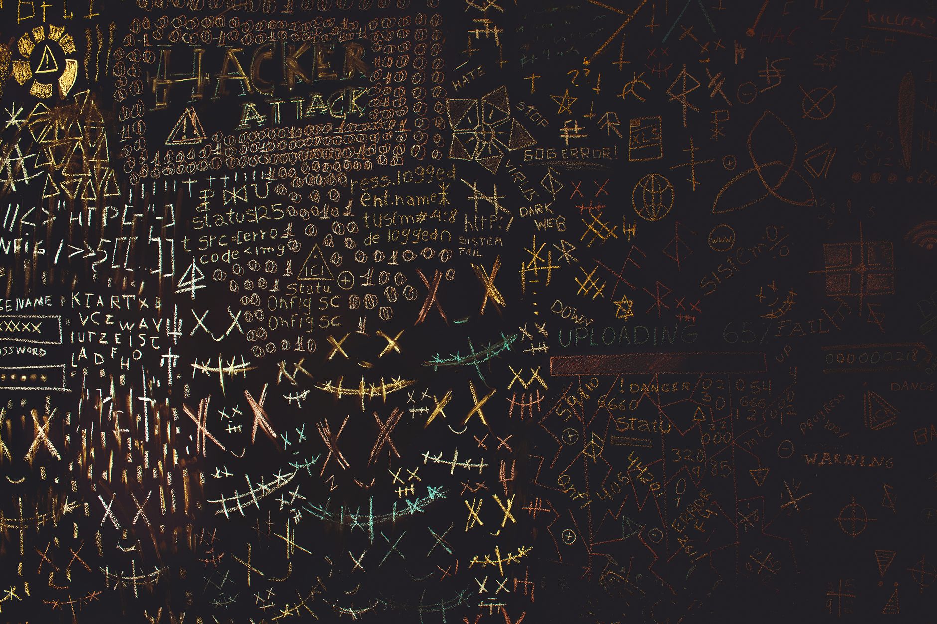Complex chalkboard art featuring hacking symbols, codes, and geometric patterns.