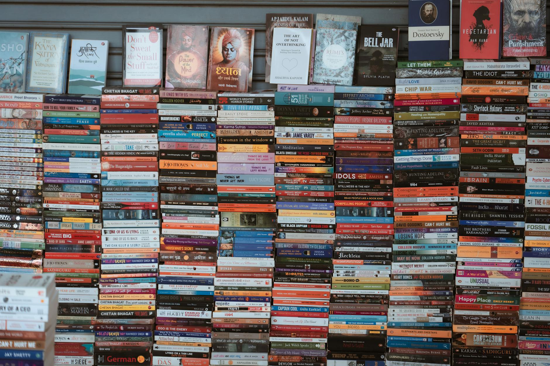 Vibrant collection of books on display in a Delhi bookstore. Perfect for book lovers and readers.