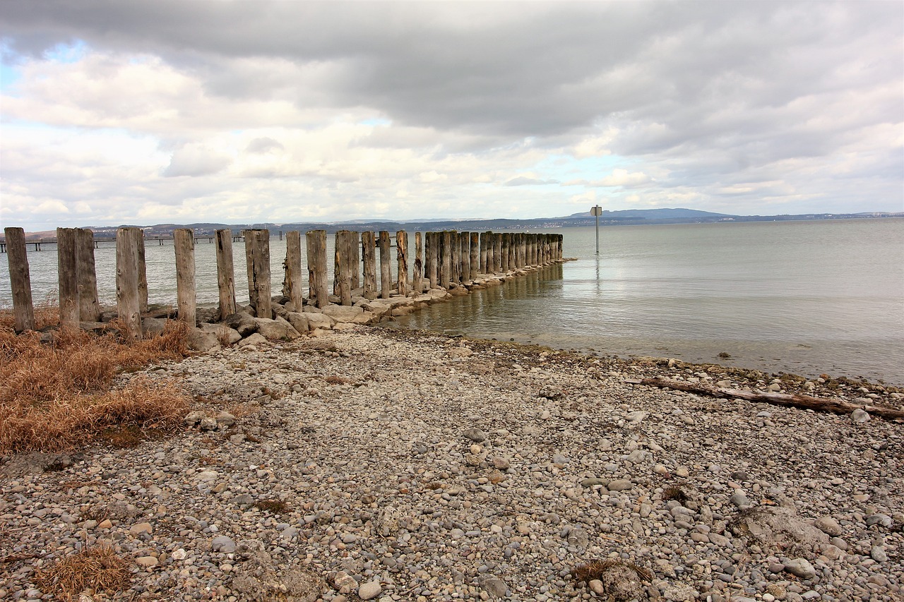 lakeside, pegs, stones, water, nature, landscape, wide angle