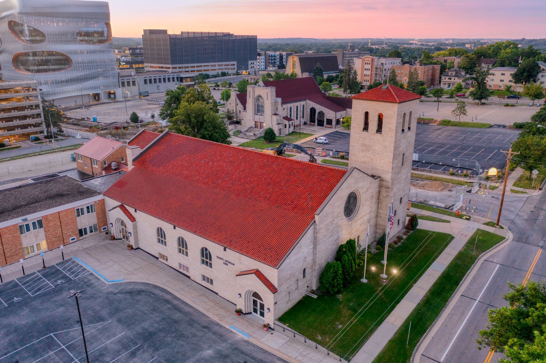 Stunning aerial view of a historic church in Rochester, MN during sunset.