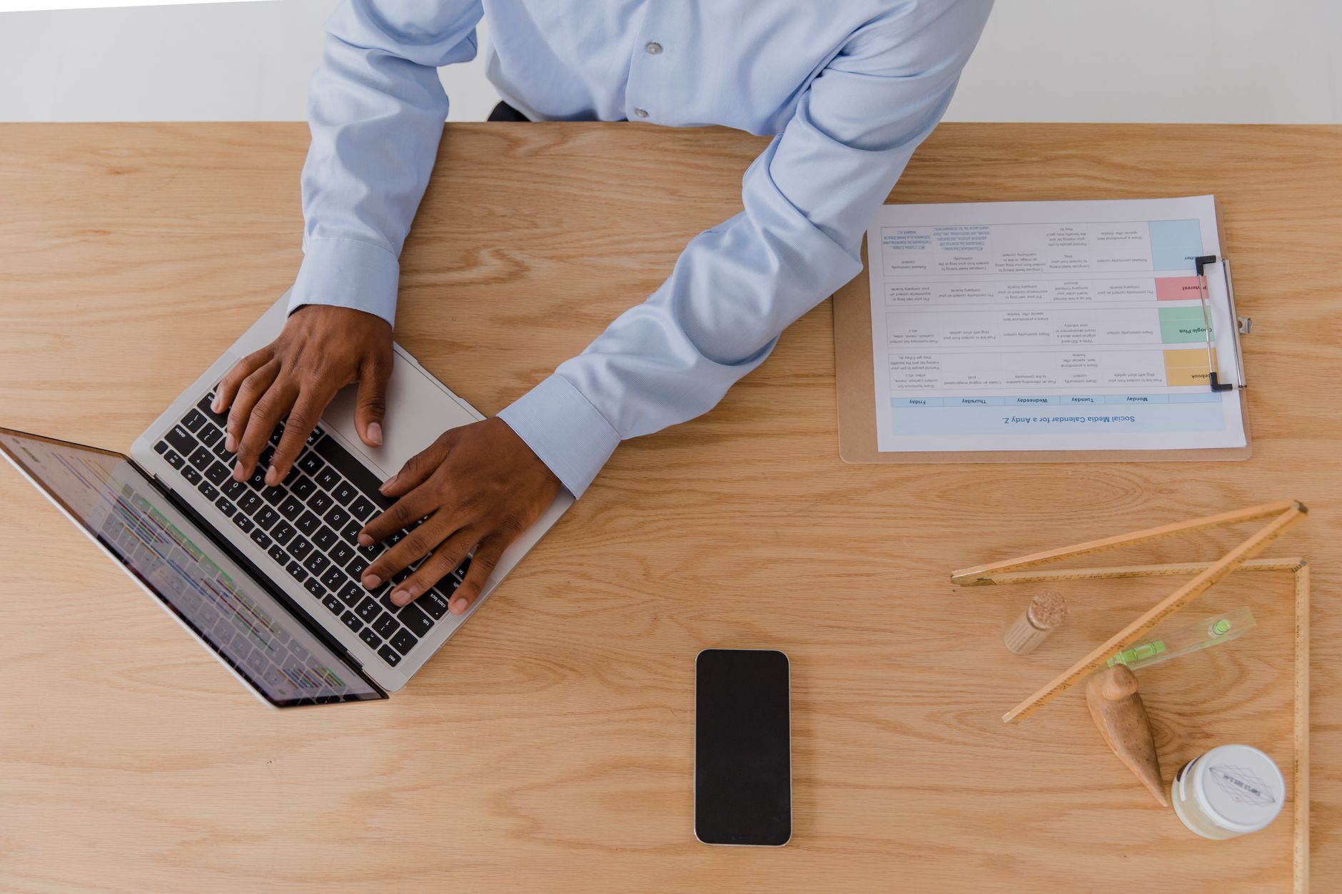 Pastor using a laptop to schedule church appointments