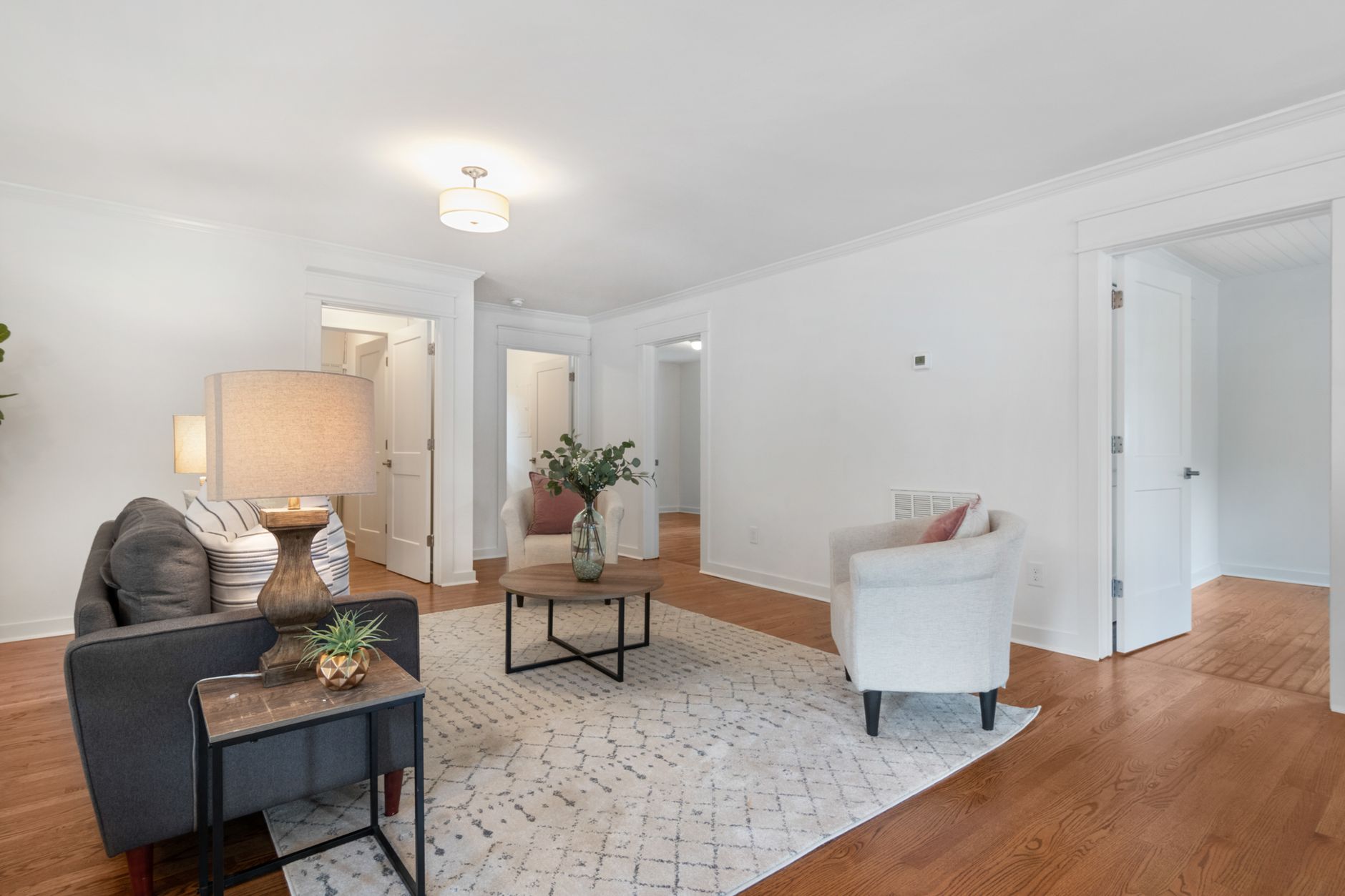 A beautifully designed living room showcasing minimalist elegance with modern furnishings.