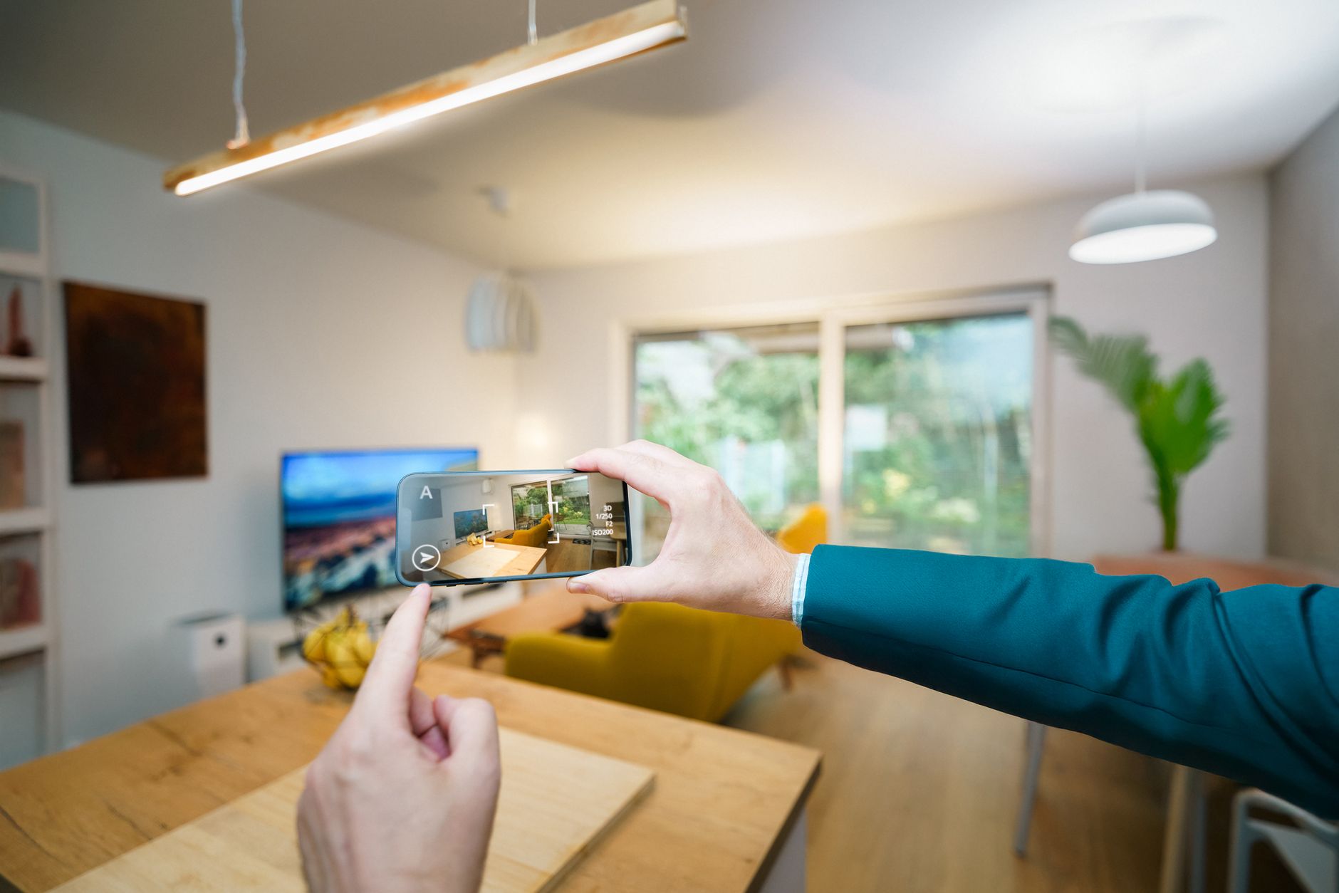A modern living space with minimalist decor captured using smartphone technology.