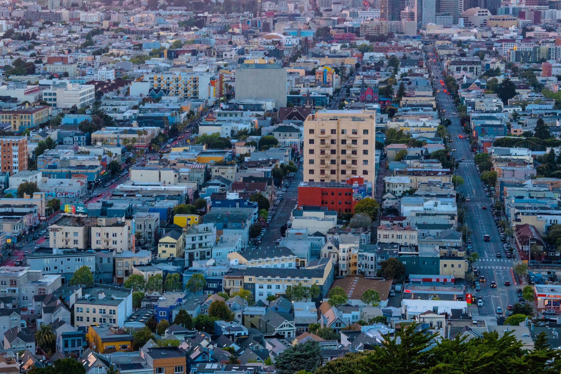 Stunning aerial view of San Francisco's diverse urban landscape showcasing city roads and architecture.
