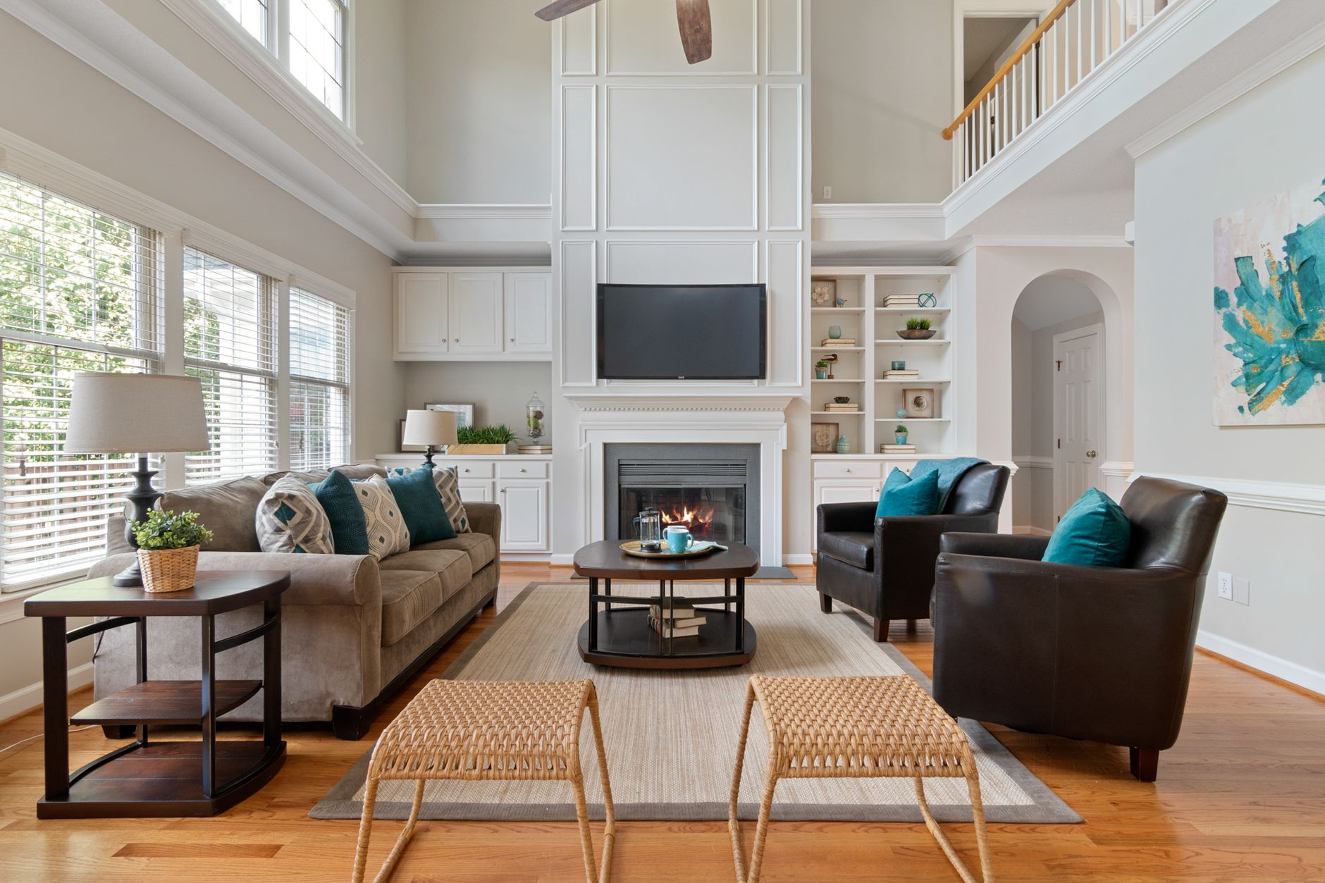 Beautifully designed living room featuring a cozy fireplace and elegant furnishings.