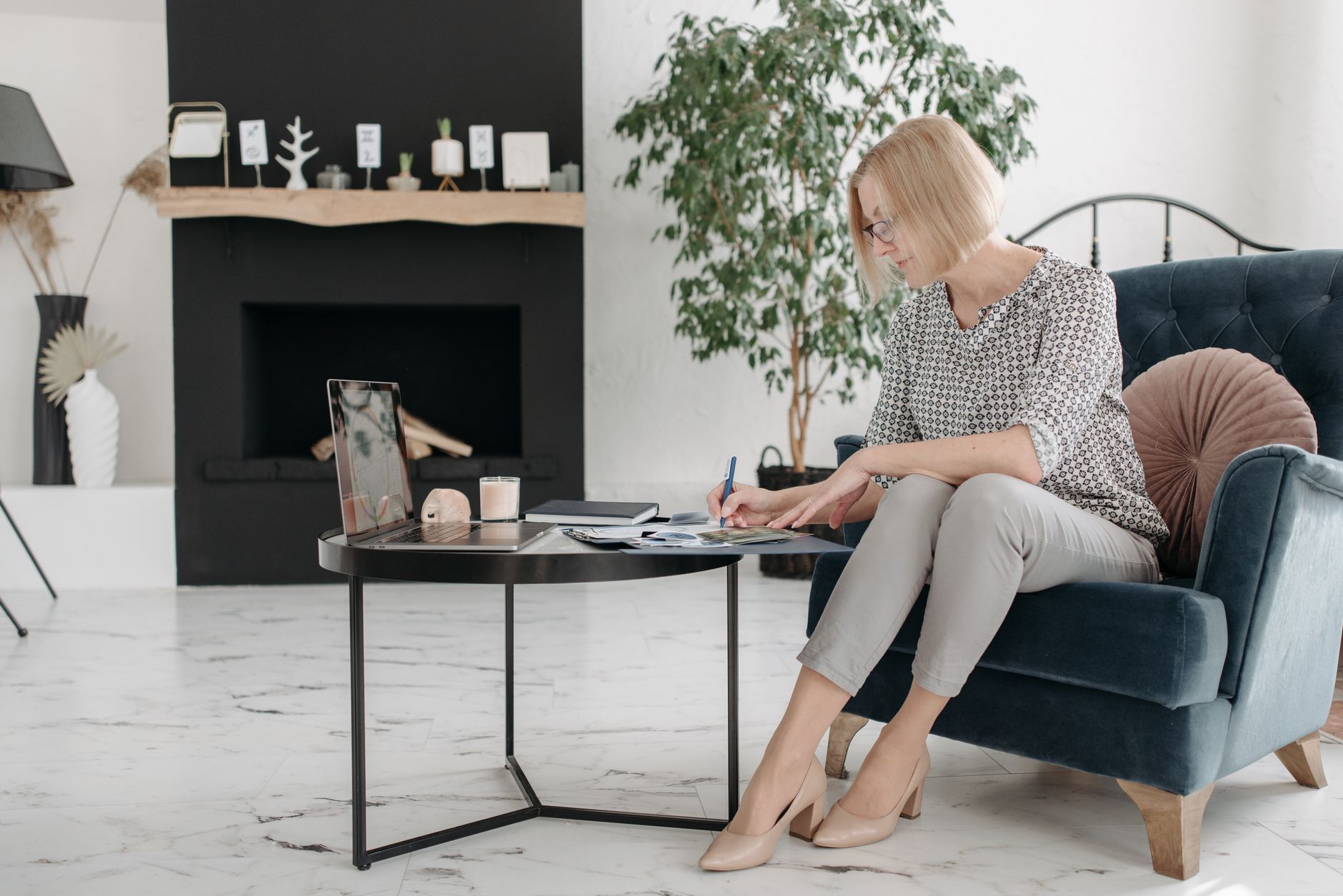 Professional evaluating virtual staging options on digital device