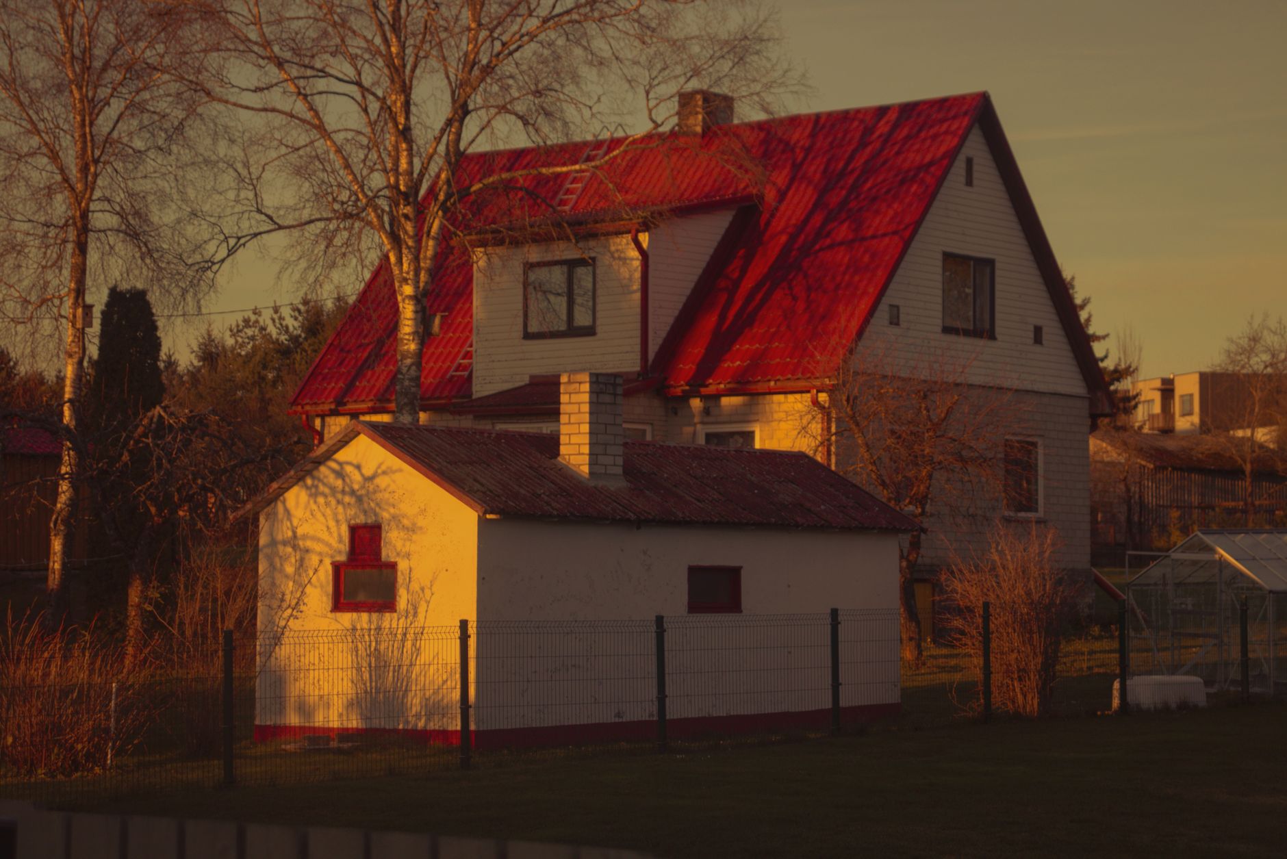Dramatic before-and-after of a home exterior with AI enhancements