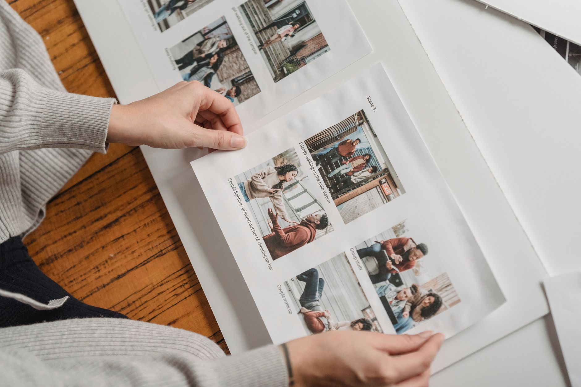 Real estate professional evaluating property images on computer