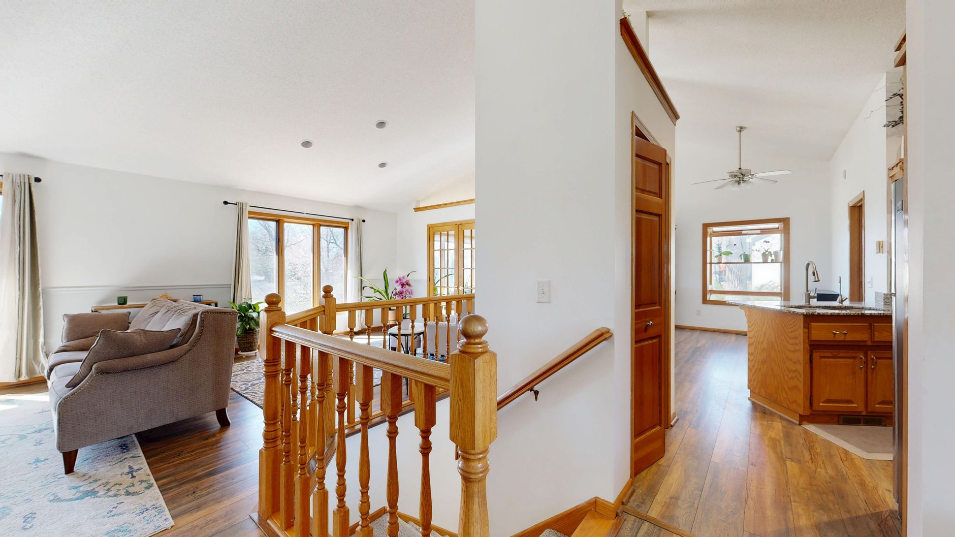 Comparison of original and AI-enhanced real estate photo showing improved lighting and staging