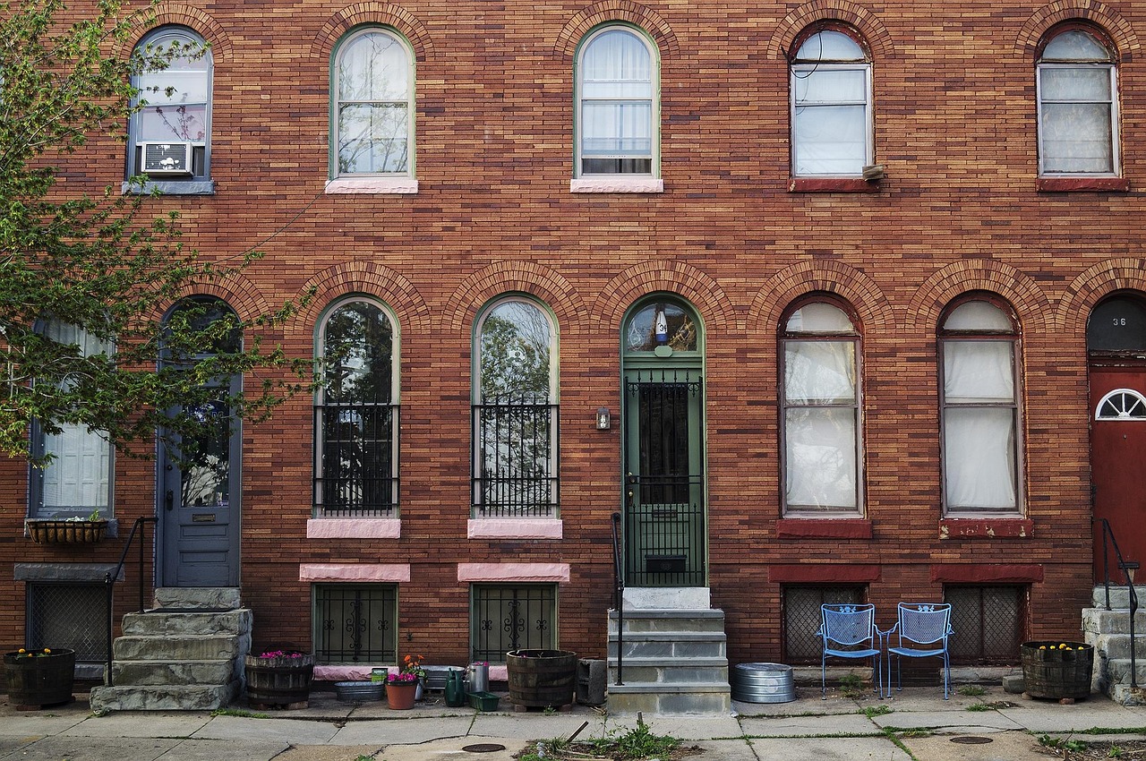 AI-enhanced photo of a historic Baltimore rowhouse showing improved lighting and architectural details