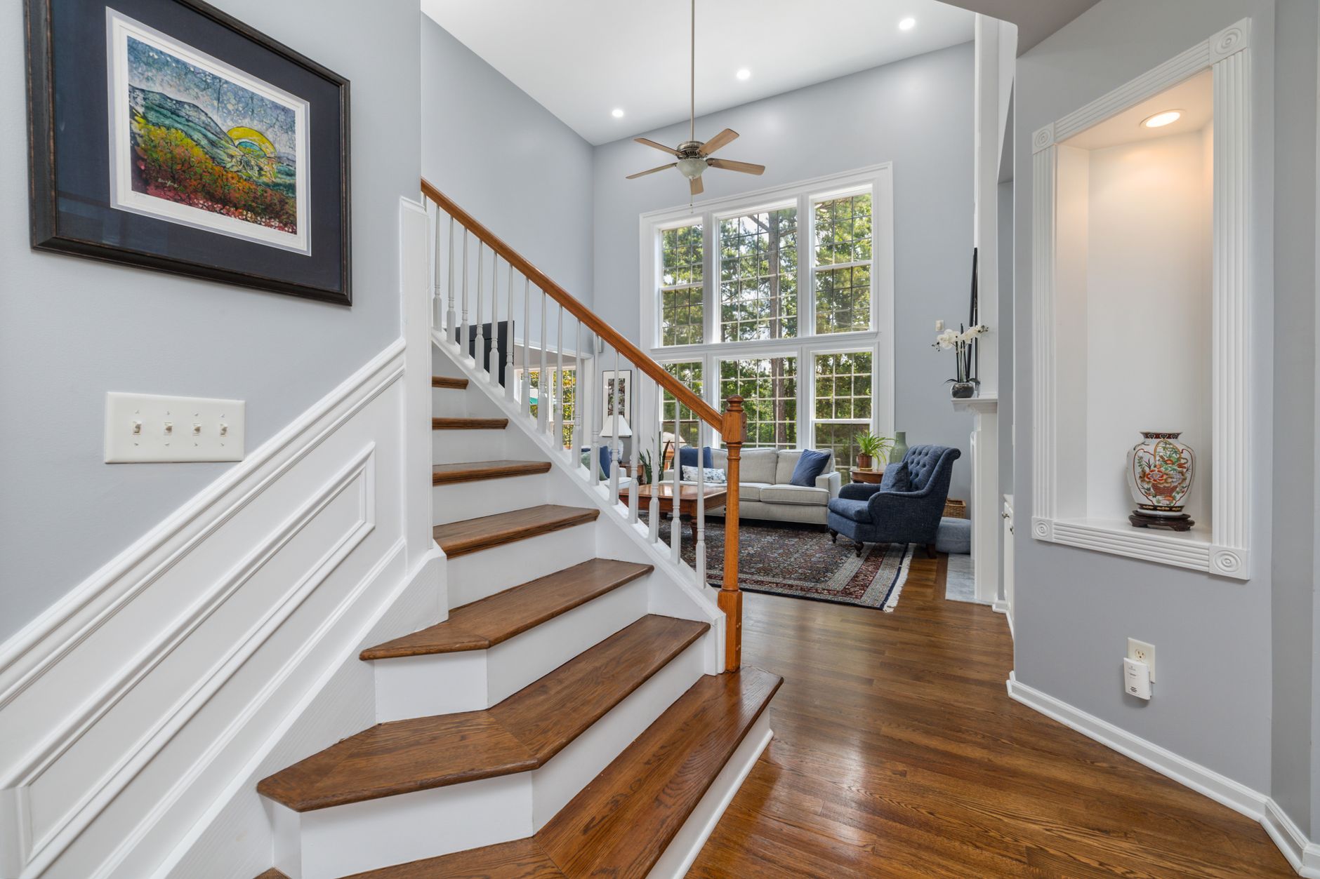 Side-by-side comparison of raw vs professionally processed property photo