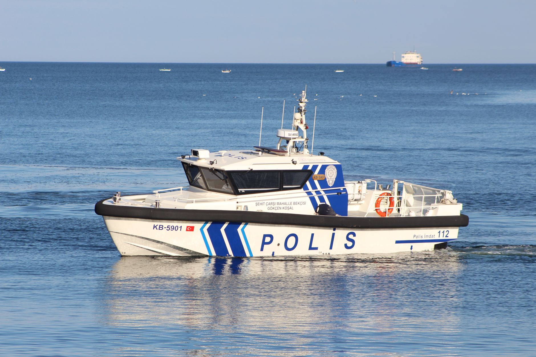 Police boat on patrol in Tekirdağ's calm waters under a clear sky.