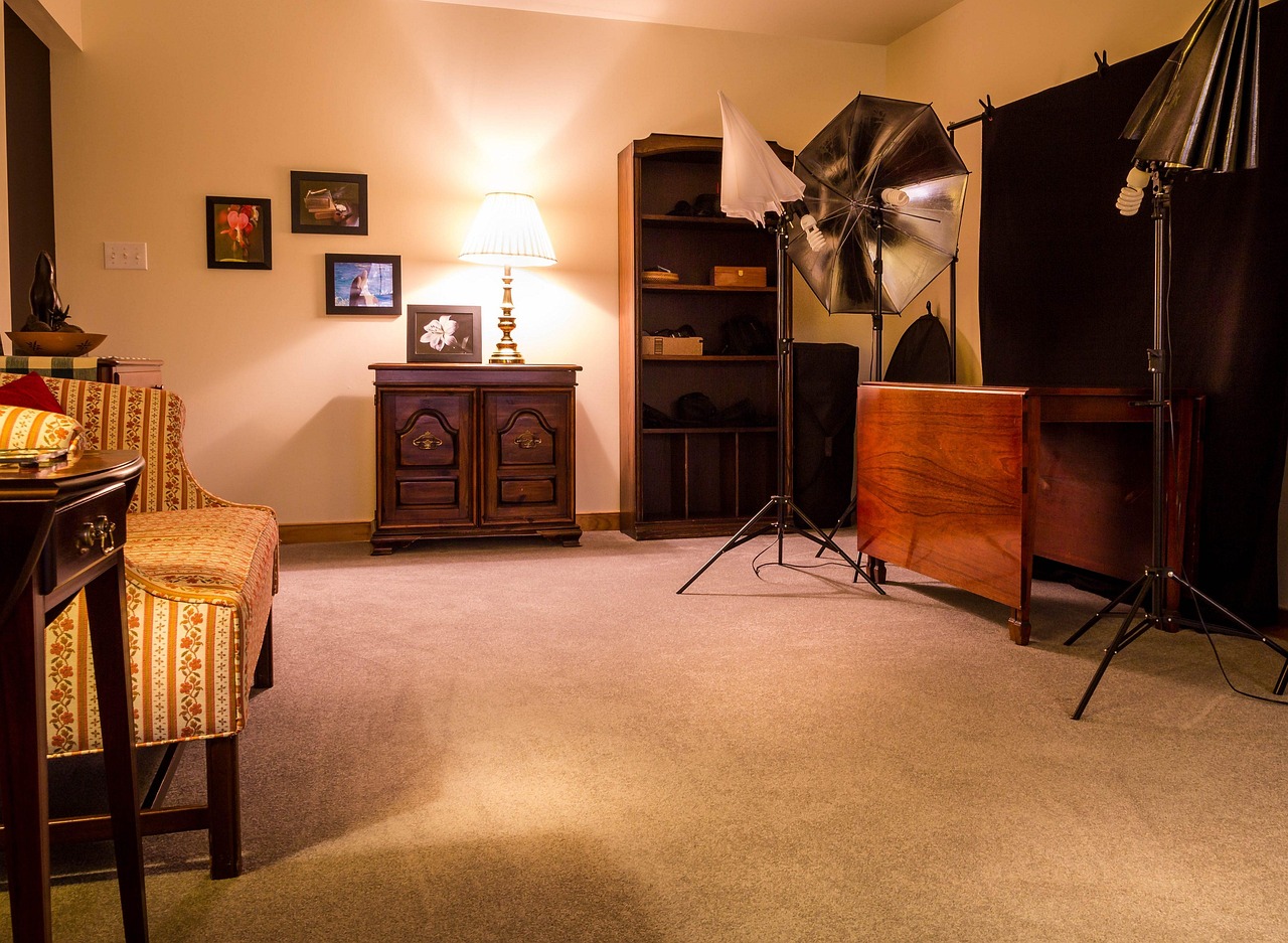 studio, bonus room, photography studio, umbrella reflectors, carpet, table, sofa, shelves, amateur photography, lighting, couch, craft room, brown room, brown table, brown photography, brown couch, brown umbrella, studio, studio, studio, studio, studio, photography studio, carpet, carpet, carpet, carpet