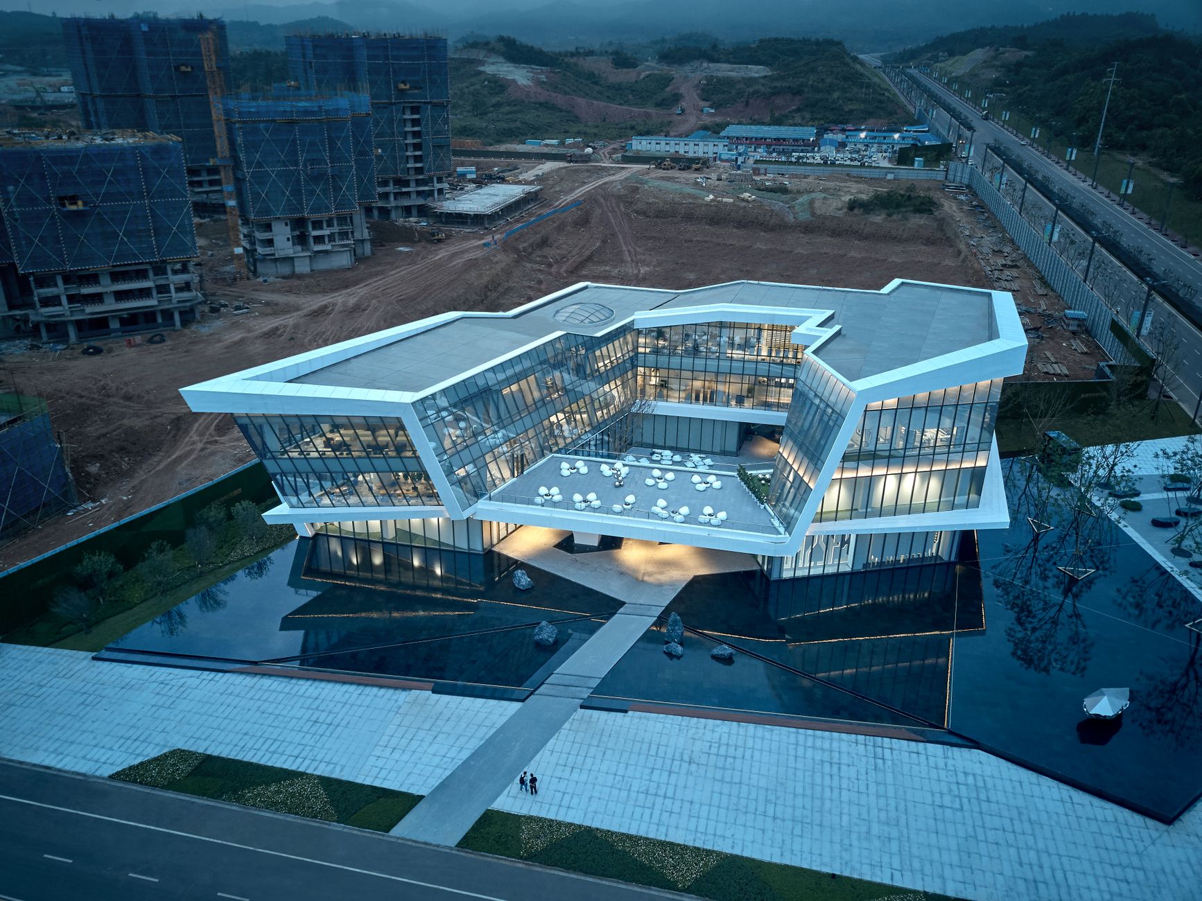 Aerial view of a futuristic building with a unique design in China.