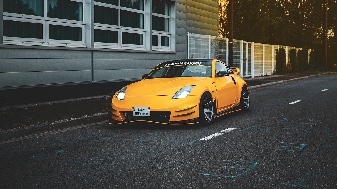 sports car, nissan, car, luxury car, yellow car, vehicle, car wallpapers, auto, automotive, automobile, road, street