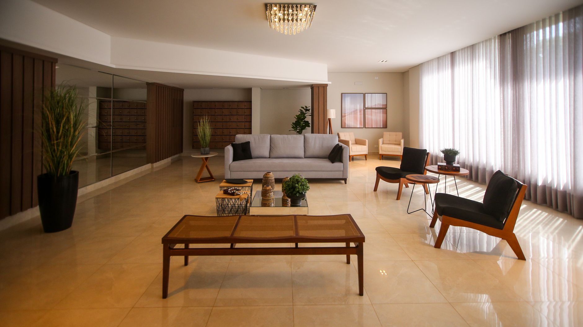 Elegant and spacious modern living room with luxurious furnishings and natural light.