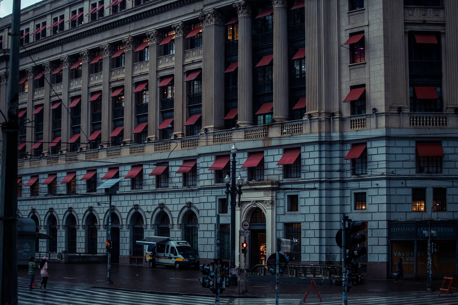 Elegant historic building with red awnings in Sao Paulo, showcasing classic architecture.