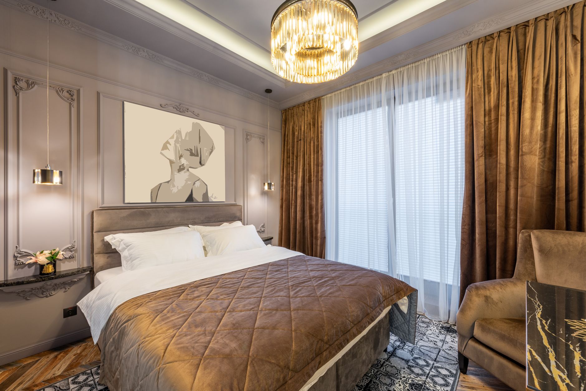 Creative design of bedroom with cover and pillows on bed against curtains in light house with artworks