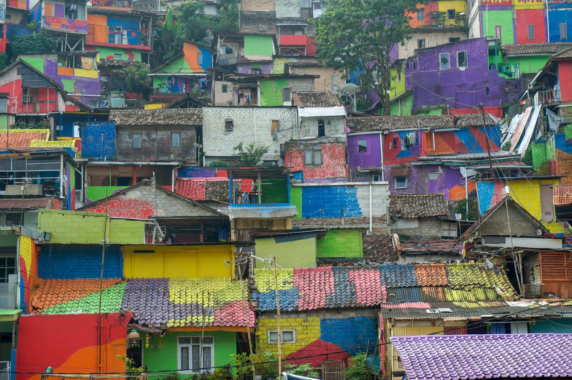 Colorful village houses with vibrant painted facades, showcasing a lively and artistic community.