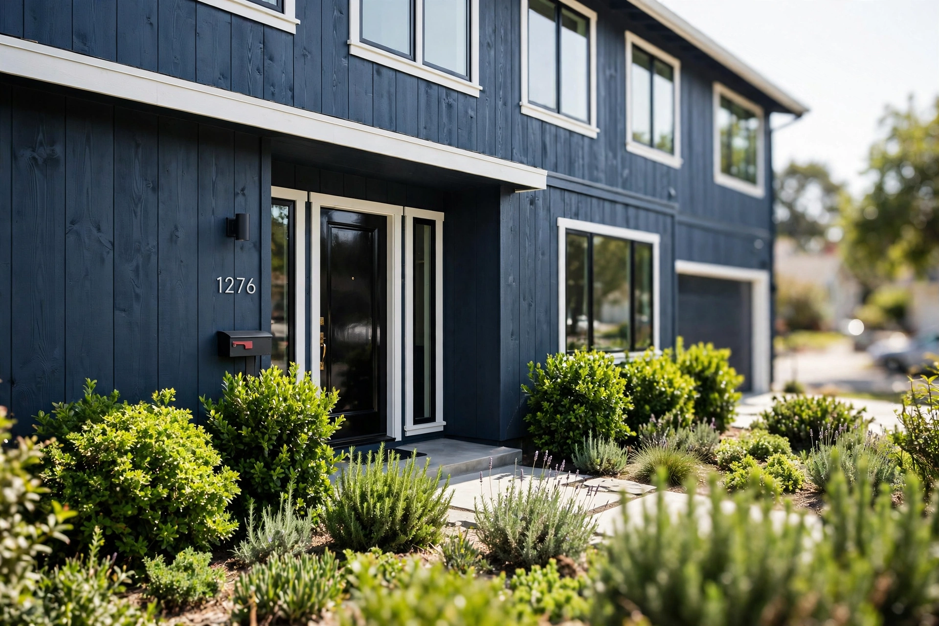 Beautiful residential house exterior painted in dark blue in Millbrae CA